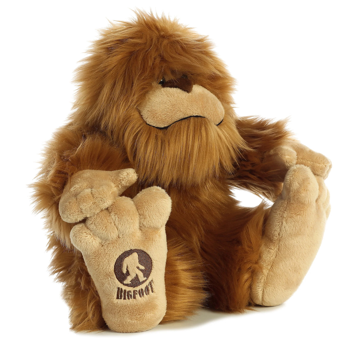 Aurora World Fantasy Bigfoot 12.5-Inch plush featuring shaggy brown fur and signature footprint stamp.