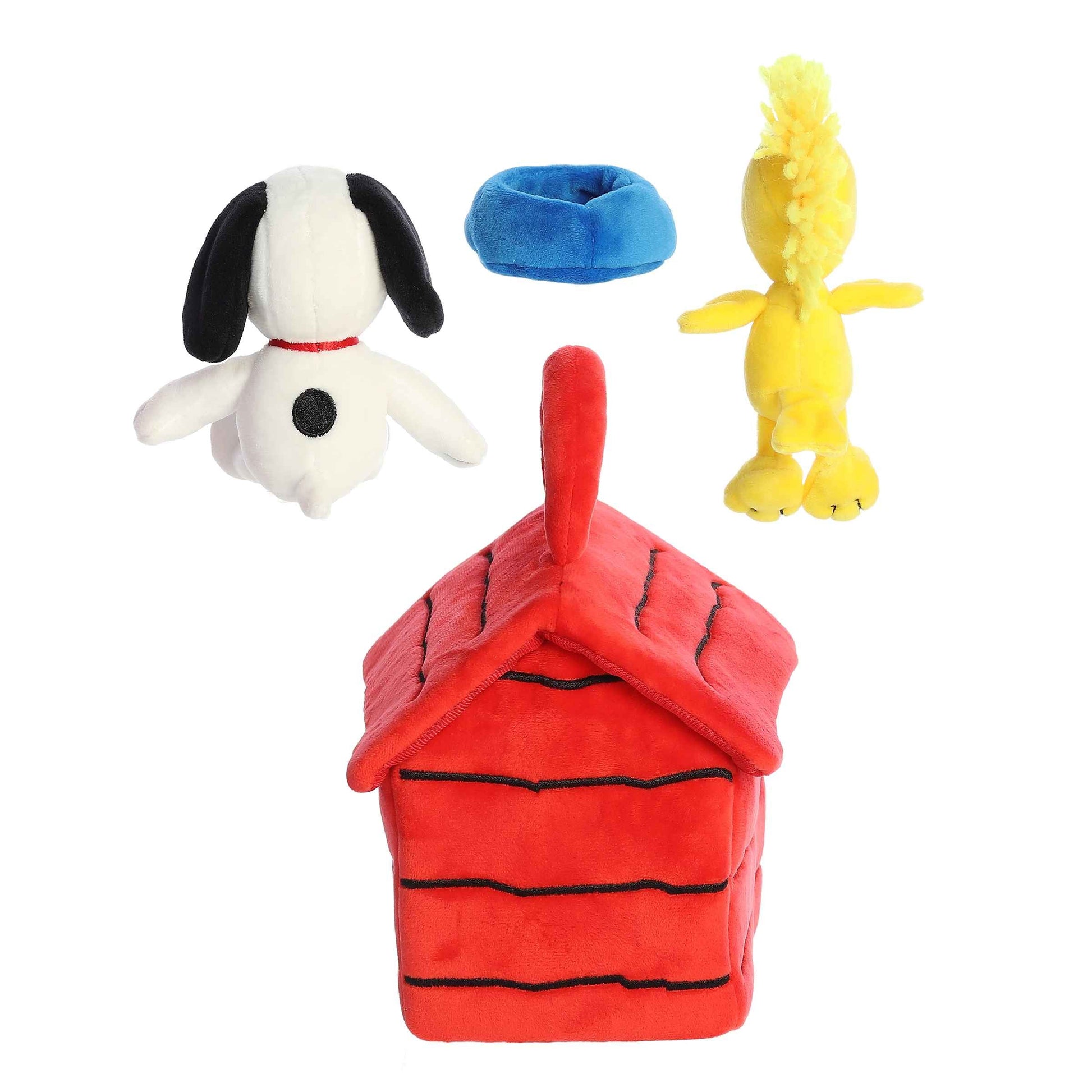 Aurora World Peanuts 8-inch plush playset featuring a red doghouse carrier, Snoopy plush, Woodstock plush, and a blue plush dog bowl.