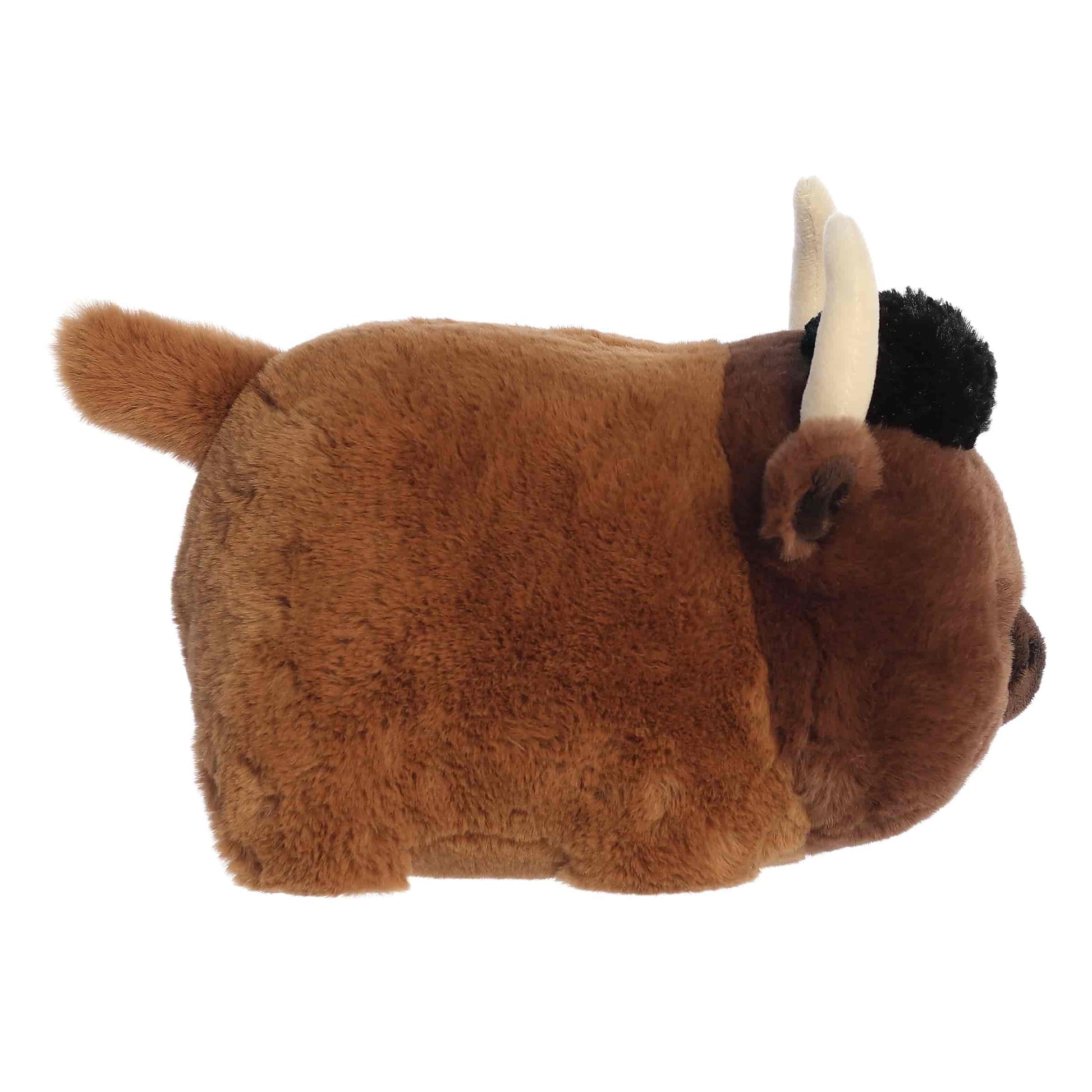 Aurora World Spudsters 10-inch Buddy Bison plush, featuring a round potato-shaped brown body, curved horns, and a black tuft of hair.