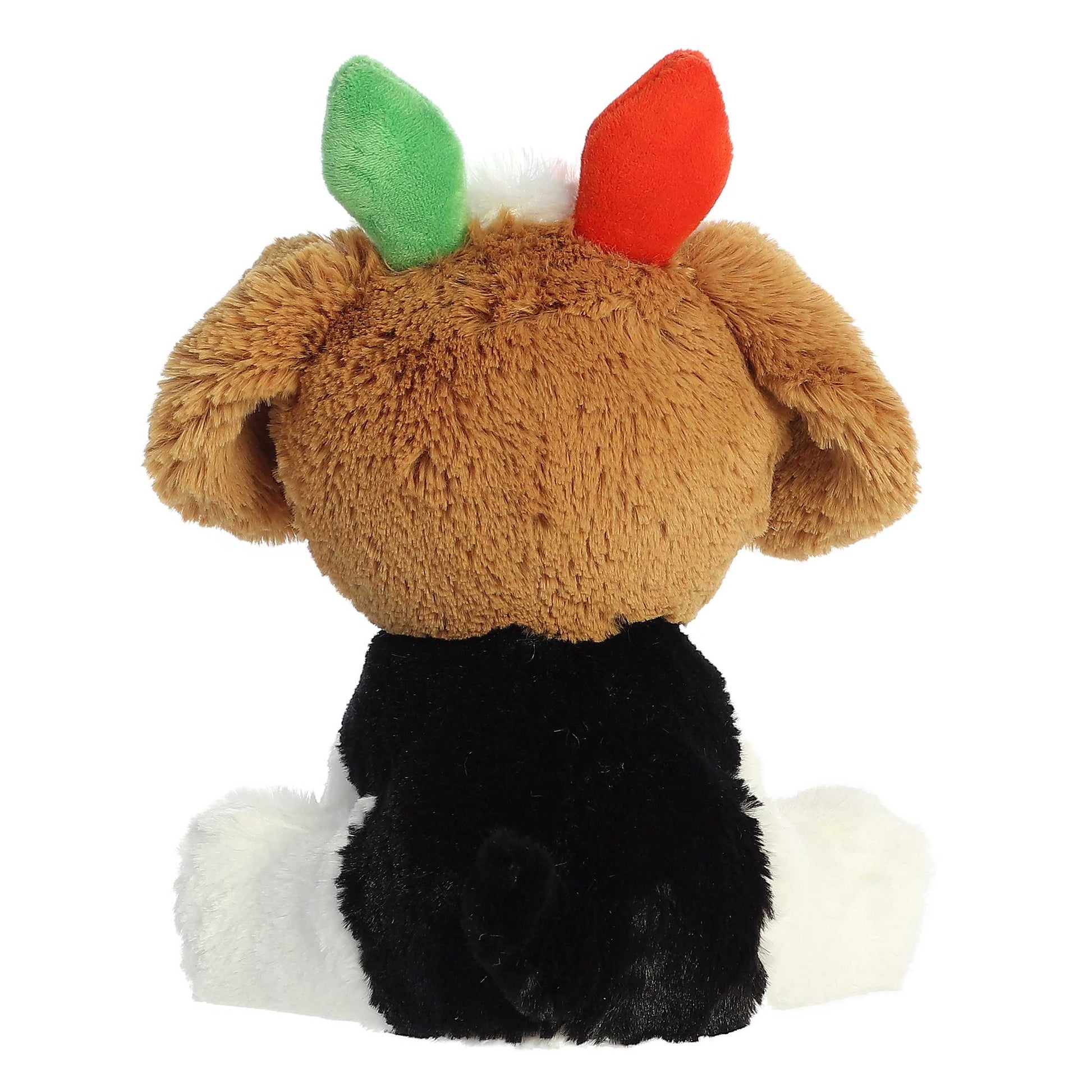 Plush toy resembling a reindeer with a brown head, green antlers, red nose, black body, and white feet on a white background.