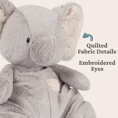 Gray stuffed elephant toy with quilted fabric details and embroidered eyes on a white background.