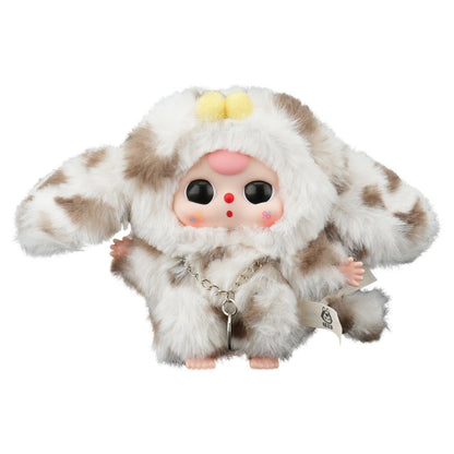 Plush toy with a fluffy white and brown coat on a white background