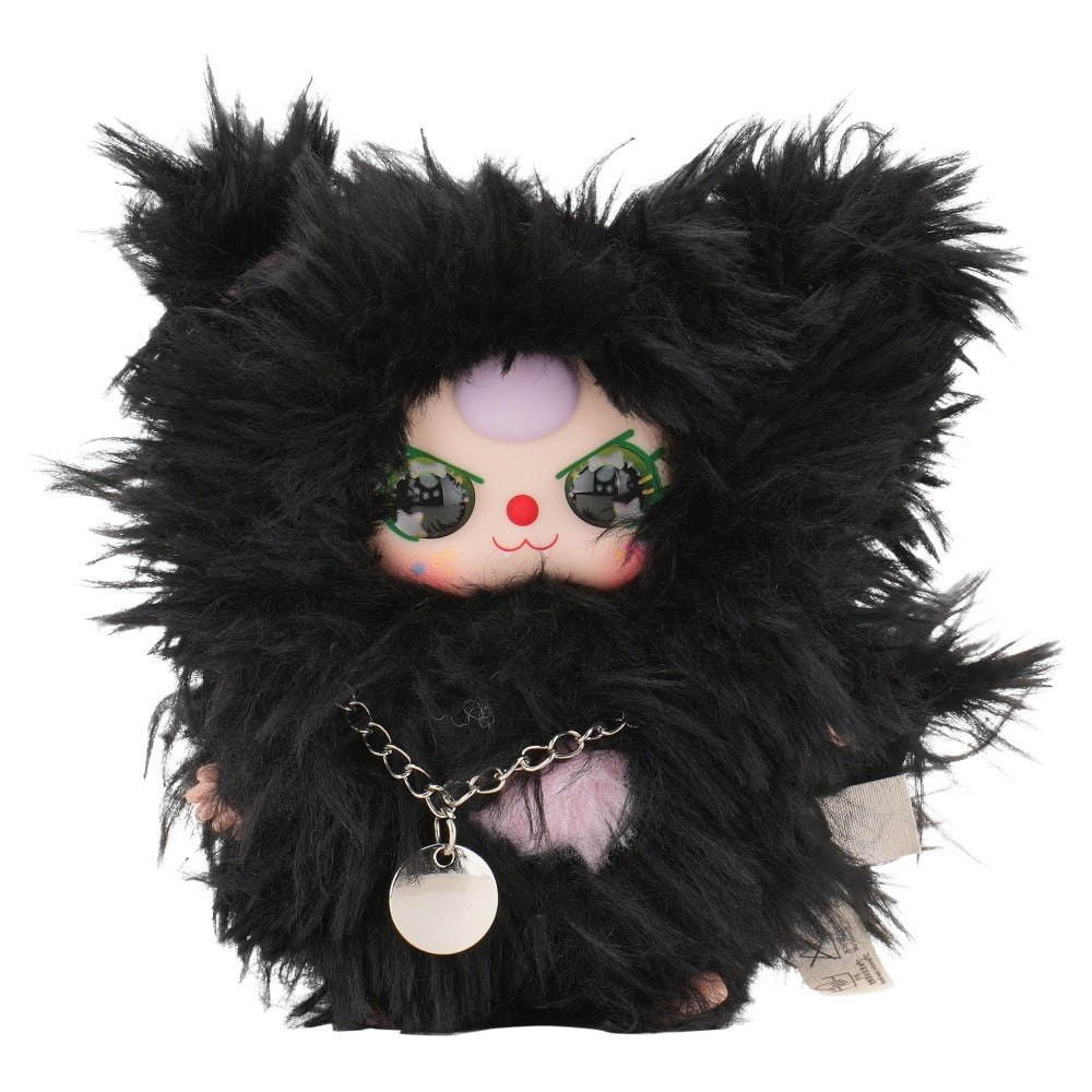 Plush toy with black fur and colorful face on a white background