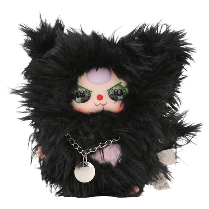 Plush toy with black fur and colorful face on a white background