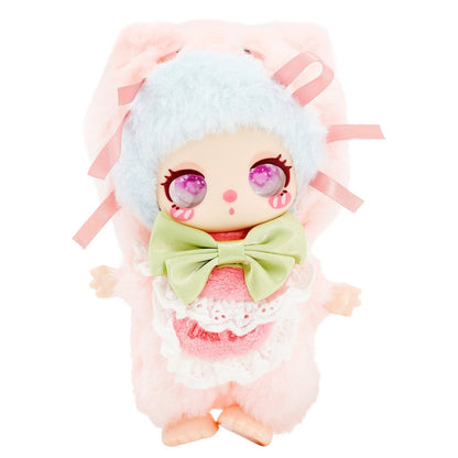 Plush toy with pastel colors and a bow on a white background