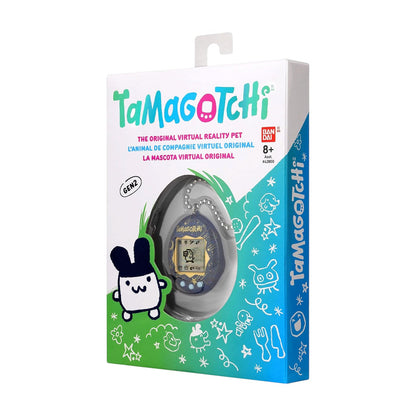 Tamagotchi original virtual reality pet in its original white, green, and blue packaging, featuring the Tamagotchi logo and character designs.