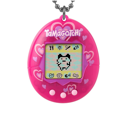 A pink Tamagotchi handheld electronic pet toy pendant with a silver ball chain, featuring heart patterns and a pixelated screen on a white background.