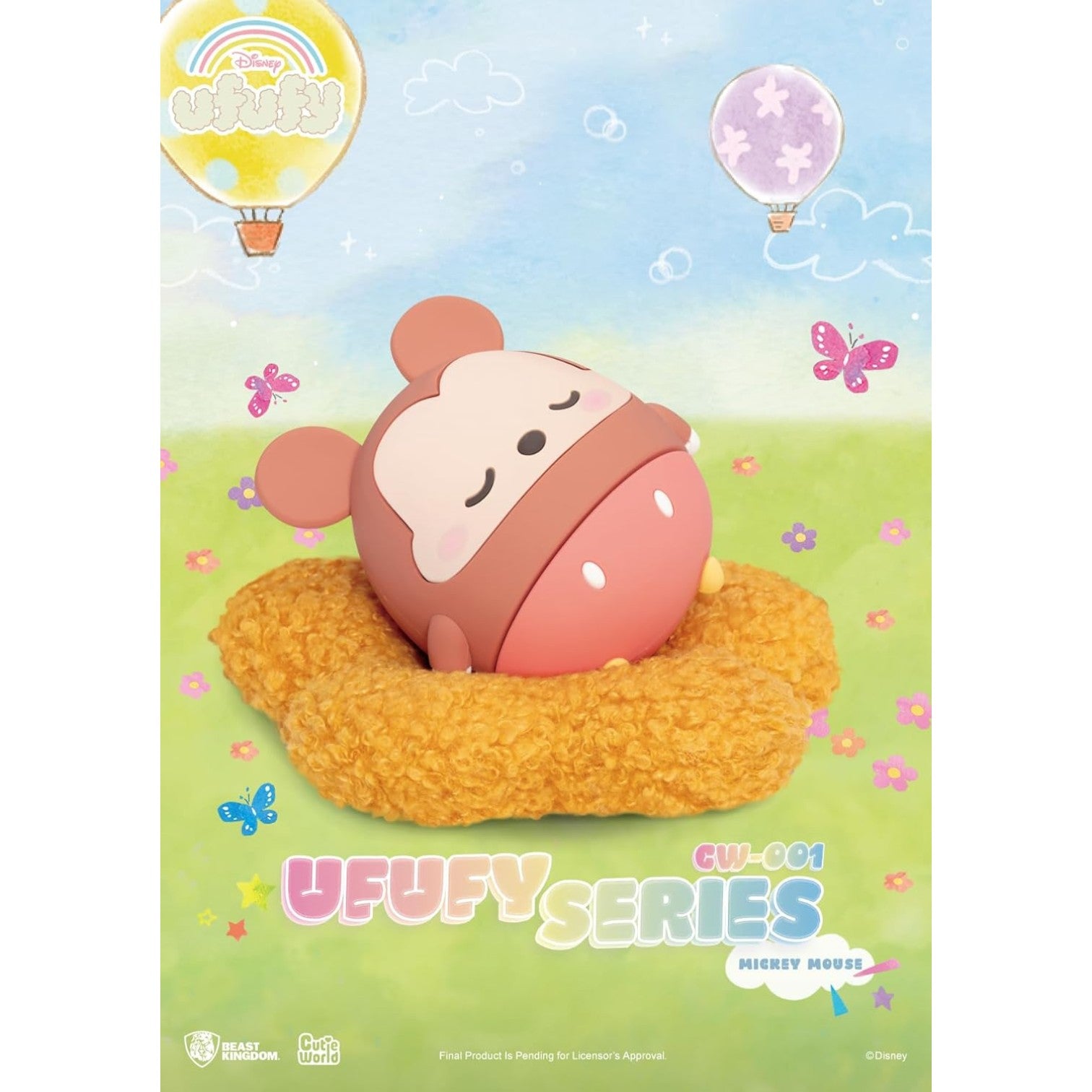 Mickie Mouse Ufufy Figure laying on an orange cushion