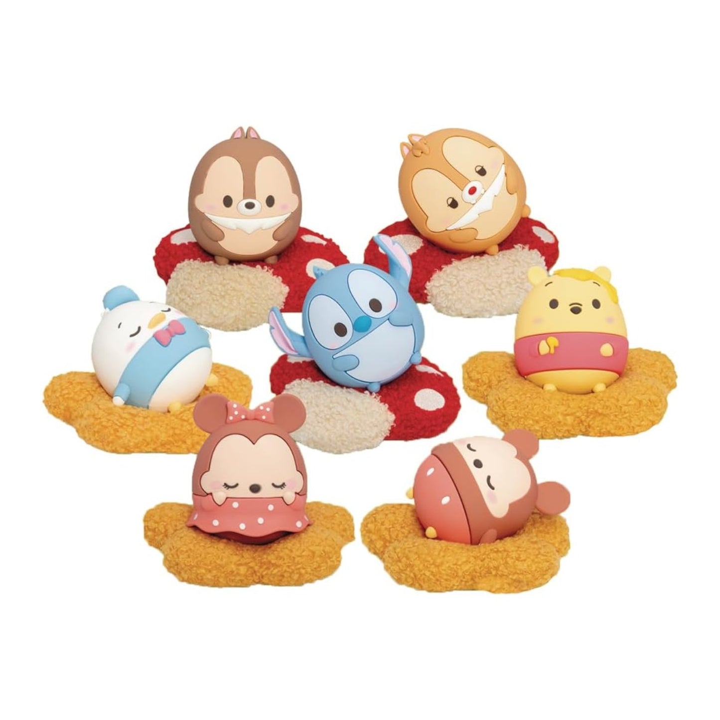 Group shot of Beast Kingdom Mini Egg Attack Disney Ufufy Series figures, including Stitch, Chip, Dale, and Winnie the Pooh sleeping on cushions.