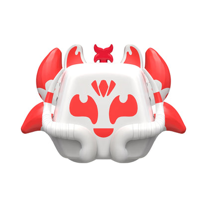 Kitsune toy with red accents on a white background