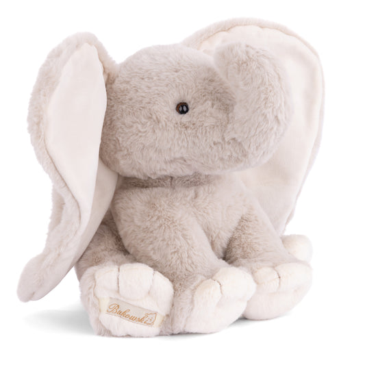 Bukowski Bears August elephant plush featuring soft light grey fur, a sweet sitting pose, and oversized floppy ears.