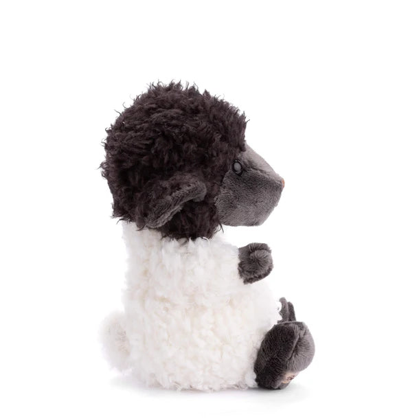 Bukowski Bears Black Sheep plush featuring a fluffy white body with contrasting soft black head, arms, and feet.