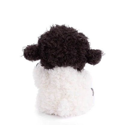 Bukowski Bears Black Sheep plush featuring a fluffy white body with contrasting soft black head, arms, and feet.
