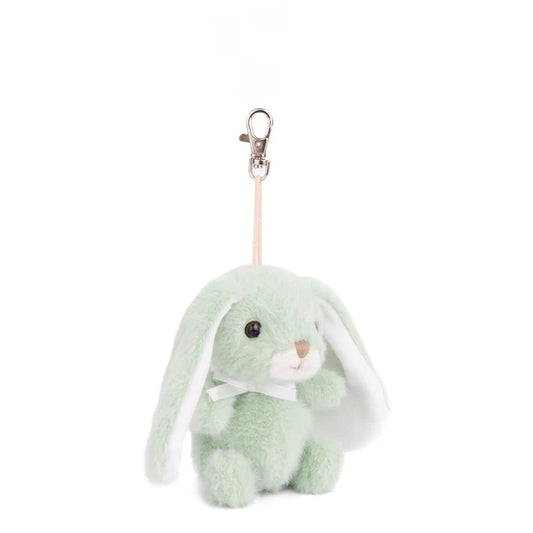 Bouncy Bunny Bag Charm in soft lime green by Bukowski Bears, featuring long floppy ears and a metal clip.