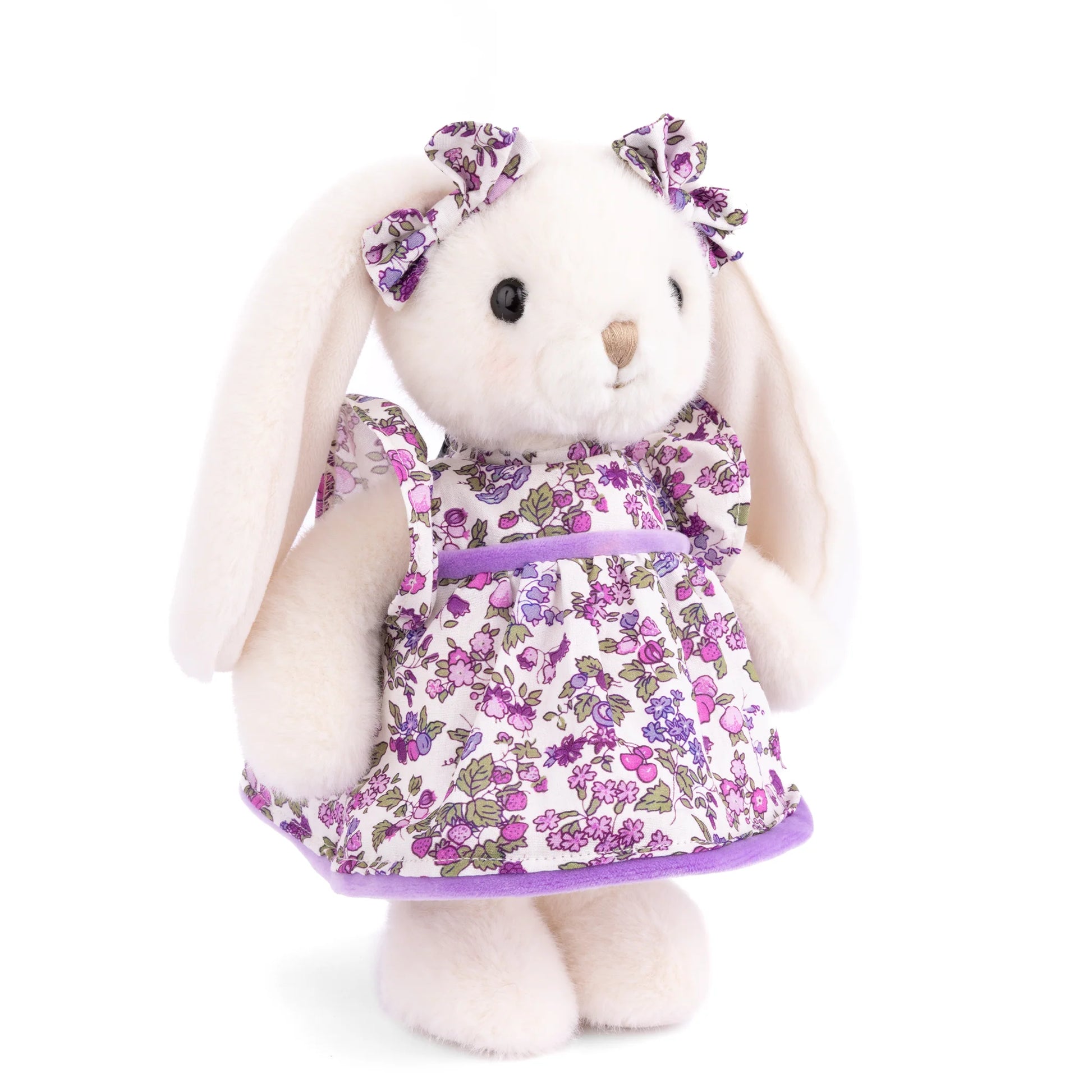 Bukowski Bears Dalia white plush bunny wearing a violet floral dress with ruffled sleeves and matching bows on her floppy ears.