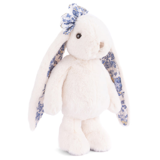 Friendly Kanina white bunny plush by Bukowski Bears, featuring long floppy ears and a bow in a blue floral pattern.
