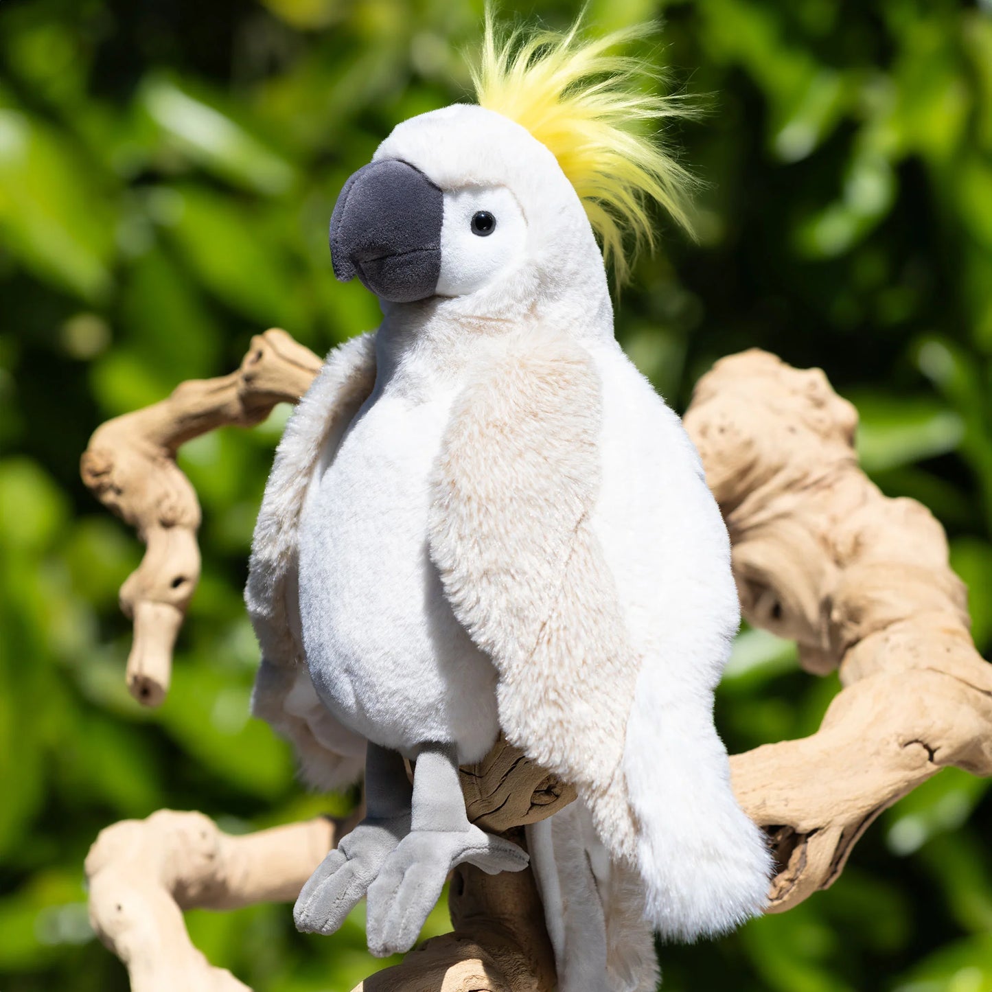 Bukowski Bears Mango cockatoo plush featuring brilliant white feathers, a striking yellow crest on its head, and a dark grey beak.
