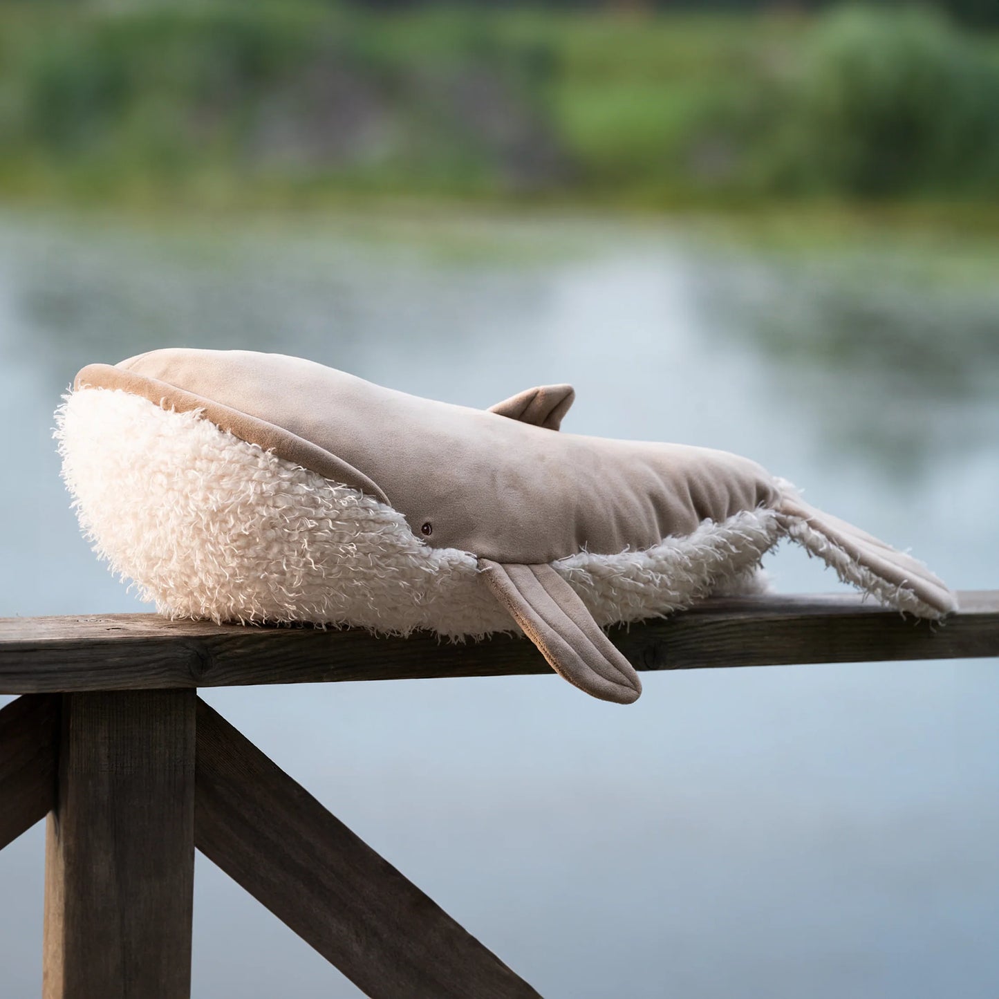 Bukowski Bears Olympus whale plush featuring soft tan skin on top and a fluffy white underbelly.