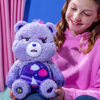 Care Bears Cozy Stormy Heart Bear soft purple sherpa plush stuffed toy featuring a brooding expression and a sailboat belly badge.