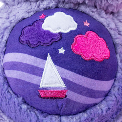 Care Bears Cozy Stormy Heart Bear soft purple sherpa plush stuffed toy featuring a brooding expression and a sailboat belly badge.