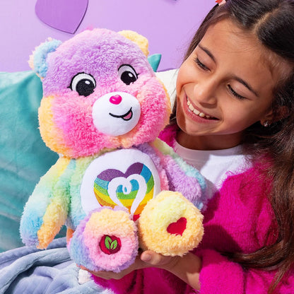 Care Bears Cozy Togetherness Bear soft rainbow sherpa plush stuffed toy featuring a dazzling embroidered rainbow heart belly badge.