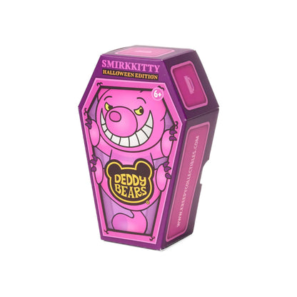 Pink teddy bear in a coffin-shaped box with 'Smirkitty' branding on a white background
