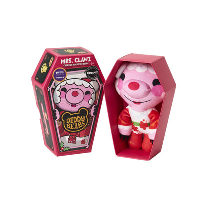 Deddy Bears Series 2 Holiday Edition Mrs. Clawz 6-inch plush in coffin box, a pink bear with white hair and a red dress.