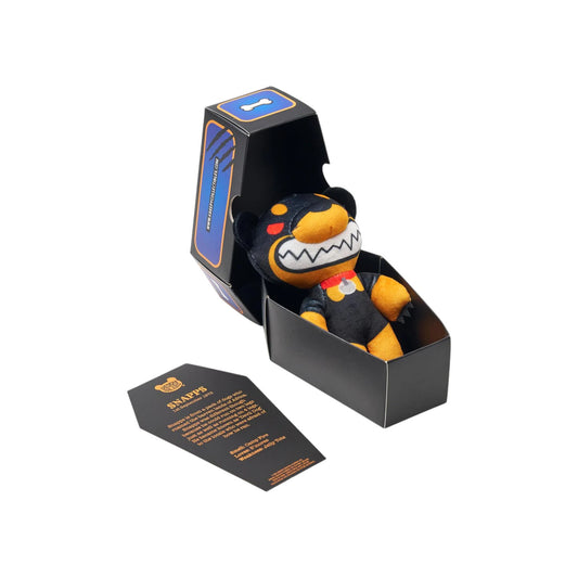 Deddy Bears Series 4 Snapps 5-inch plush in coffin box, a black and tan dog with red eyes and a jagged grin.