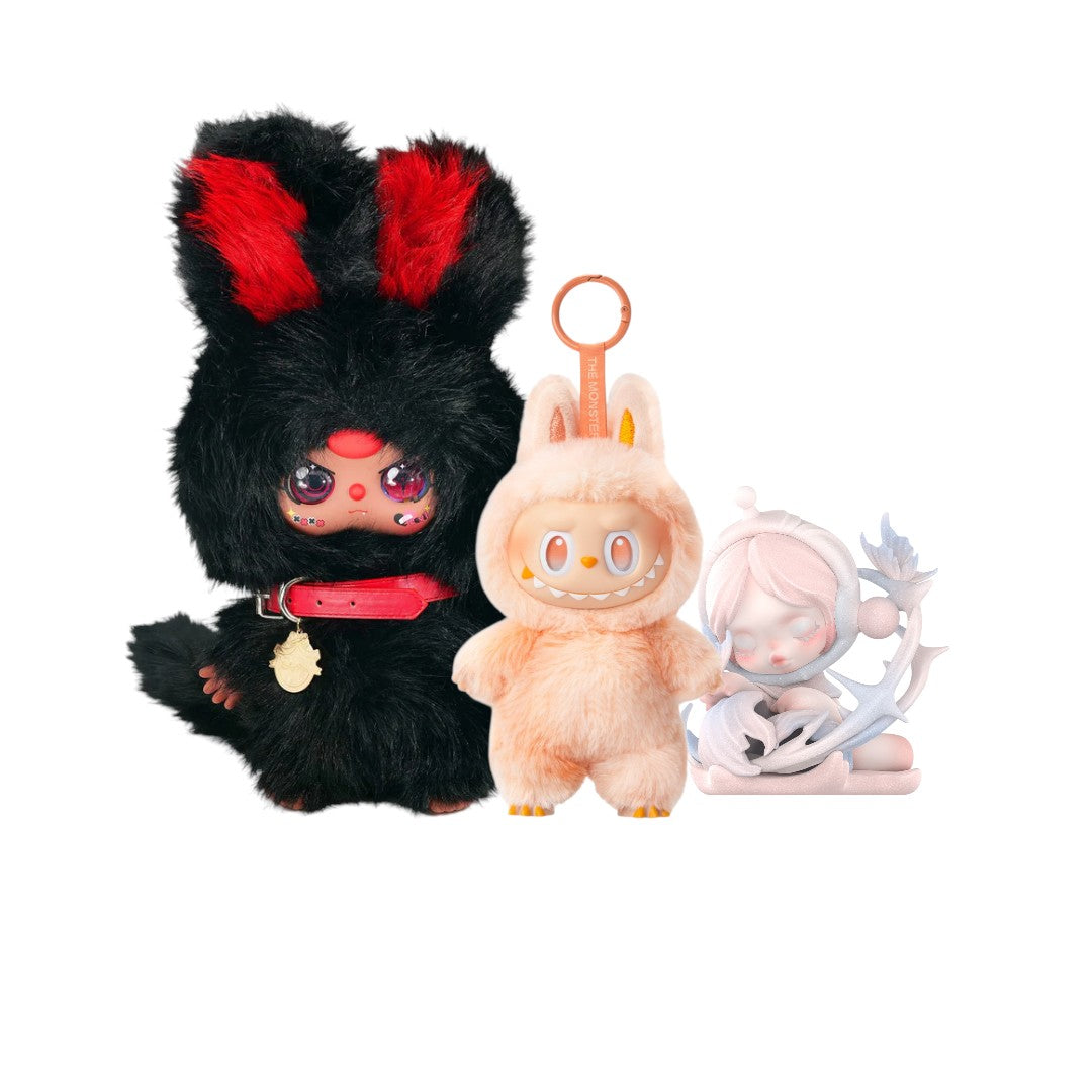 Three plush toys on a white background