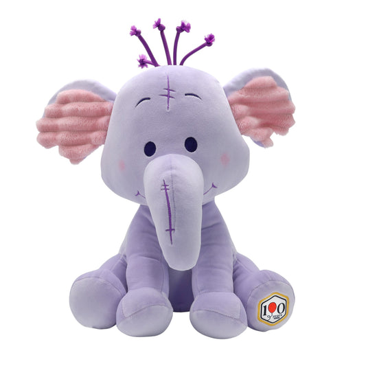 Disney 100th Anniversary Heffalump plush, a soft lavender elephant-like character with a commemorative 100 patch on the foot.