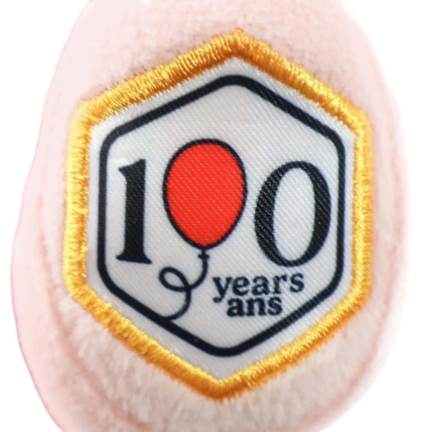 Disney 100th Anniversary Piglet plush, a soft pink pig winking with a commemorative 100 patch on the foot.