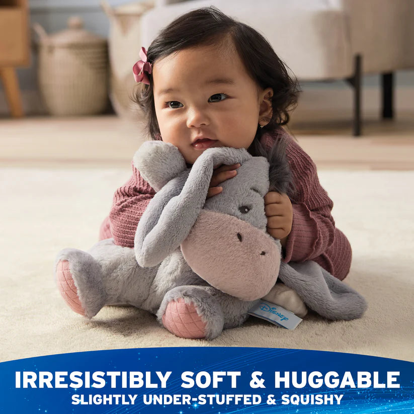 Child holding a soft toy with text about its softness and huggability.