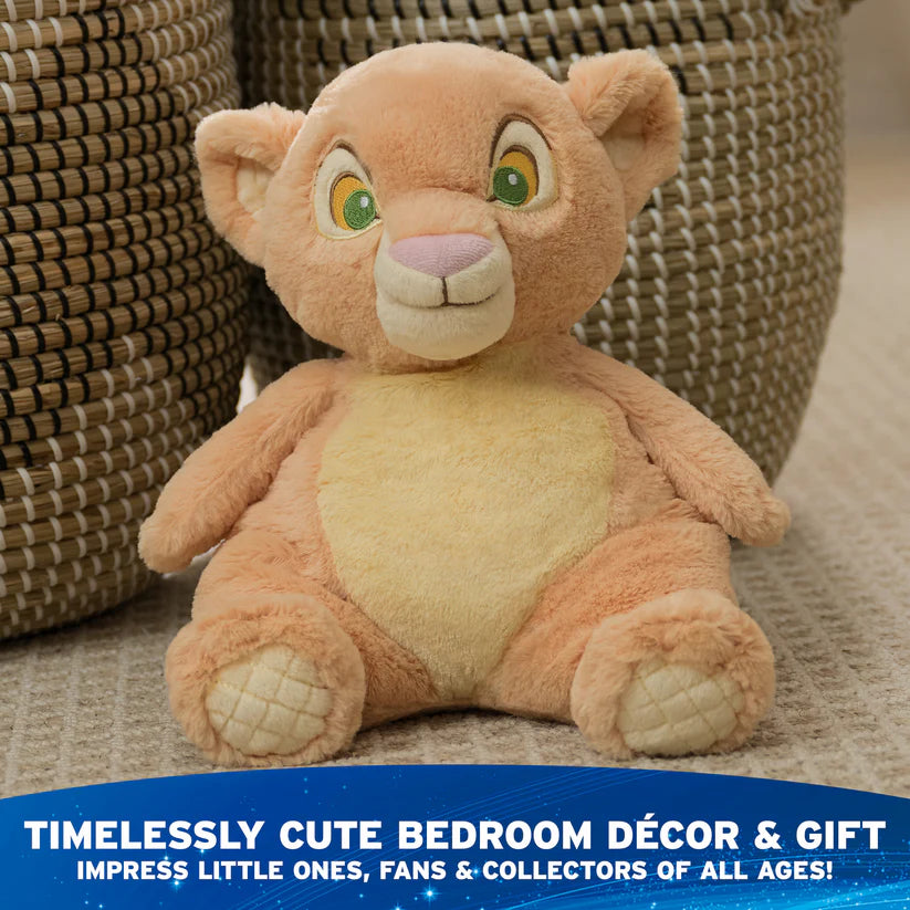 Plush toy lion sitting on a textured surface with promotional text about bedroom decor and gift.