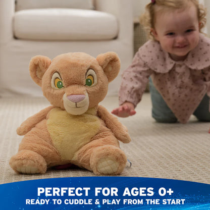 Plush toy lion with a child in the background, text indicating suitability for ages 0+