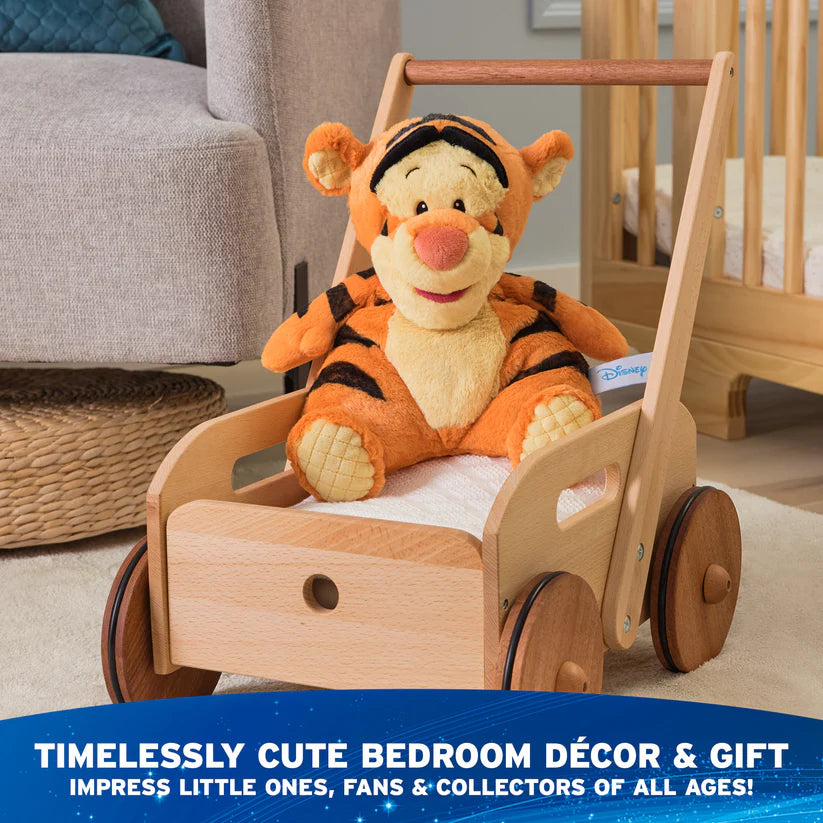 Plush tiger toy in a wooden cart with nursery background