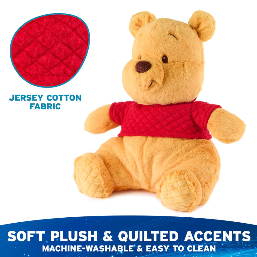 Plush bear toy with red quilted shirt and jersey cotton fabric detail, on a white background.