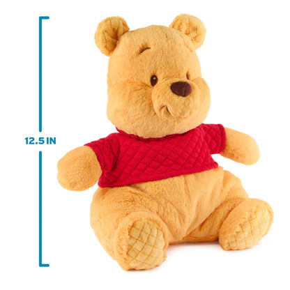 Plush bear toy with red shirt and dimensions on a white background