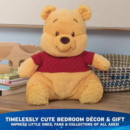 Plush bear toy with a red shirt on a wooden surface with text about decor and gift.