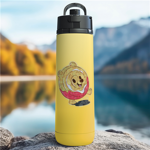 Yellow water bottle with a cartoon character on a rock by a lake with mountains in the background