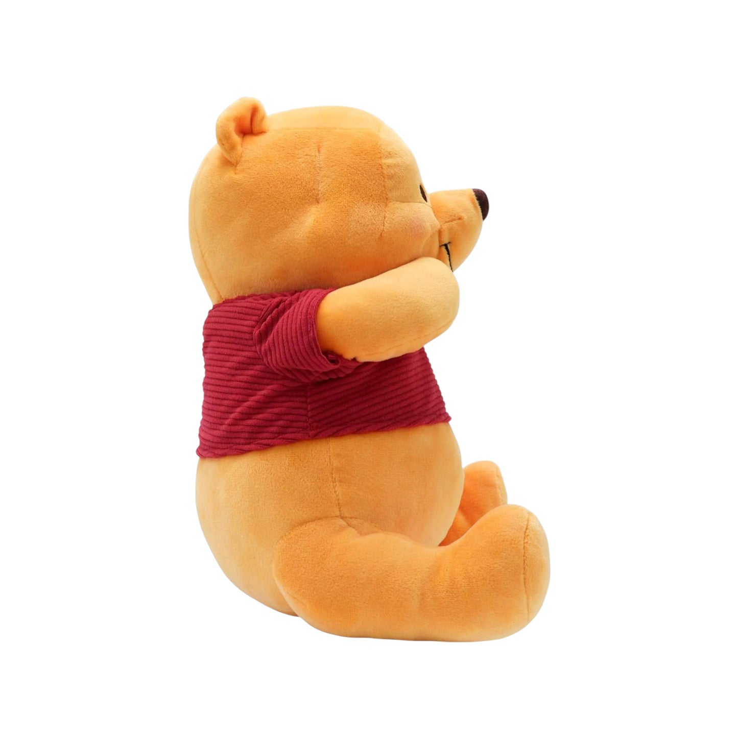 Disney Winnie the Pooh 100th Anniversary Pooh plush, sitting with paws on cheeks, wearing a red corduroy shirt with a 100 Years patch.