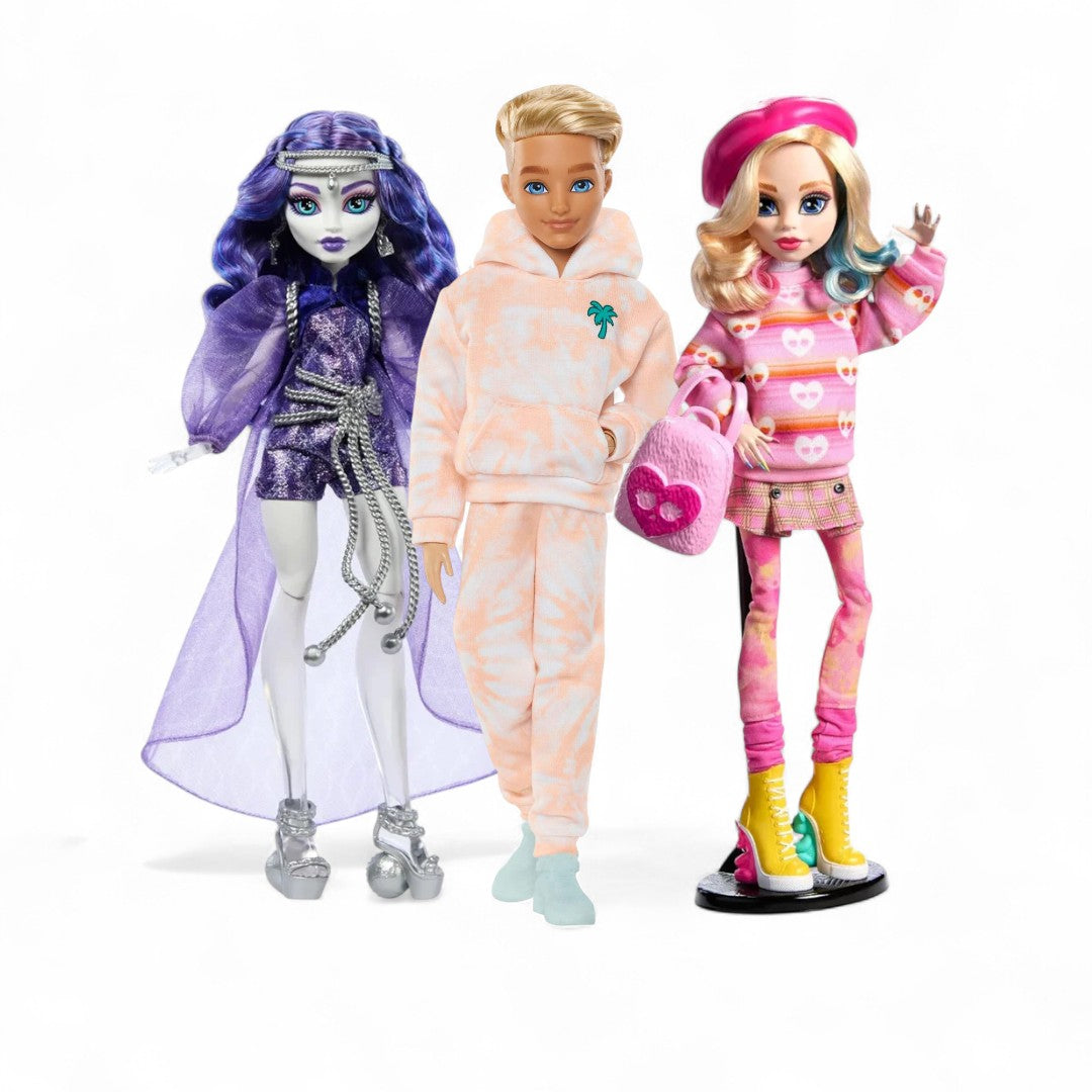 Three dolls in colorful outfits on a white background