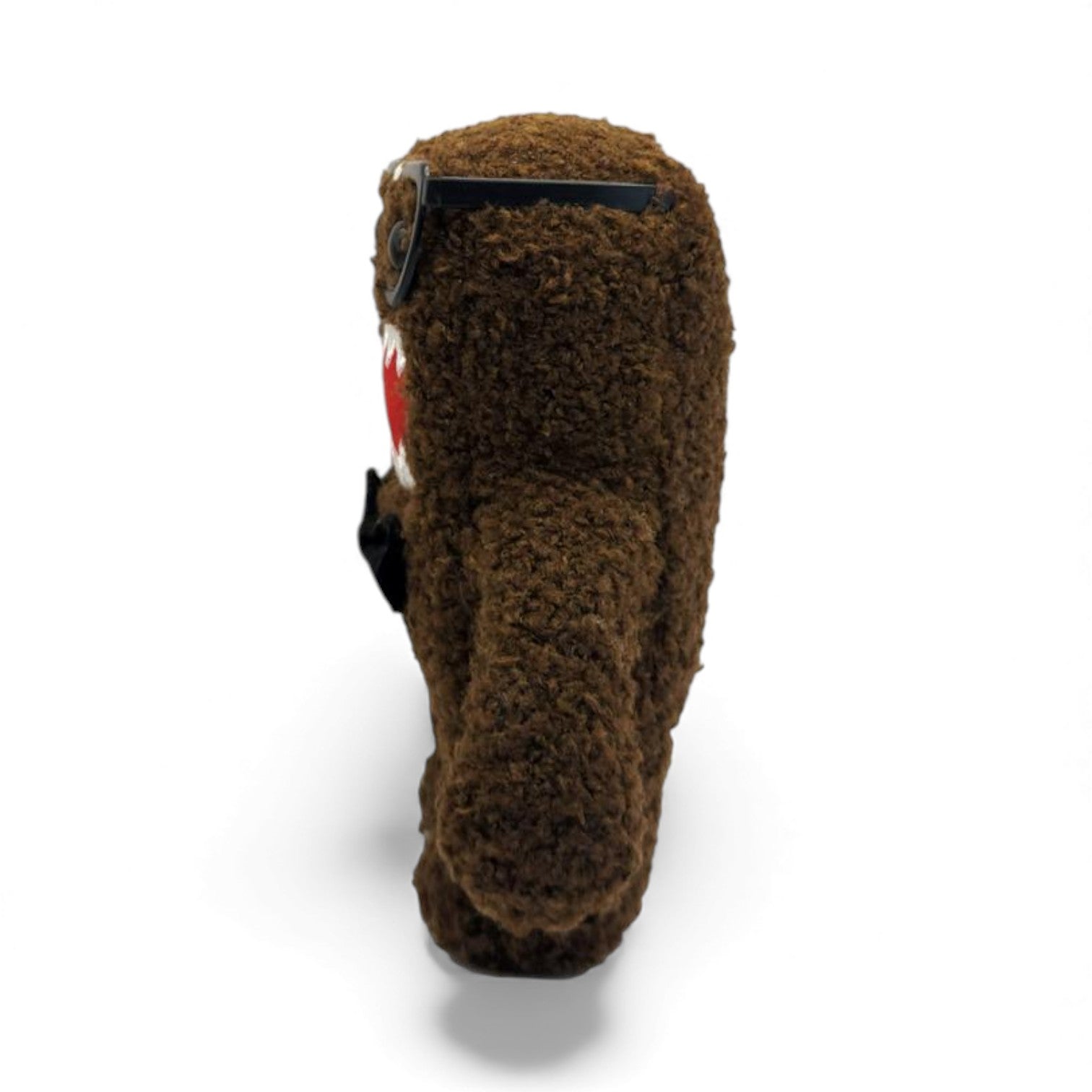 Side view of the 6.5-inch Domo plush dressed as a nerd, wearing thick black glasses with tape on the bridge and a black bow tie.