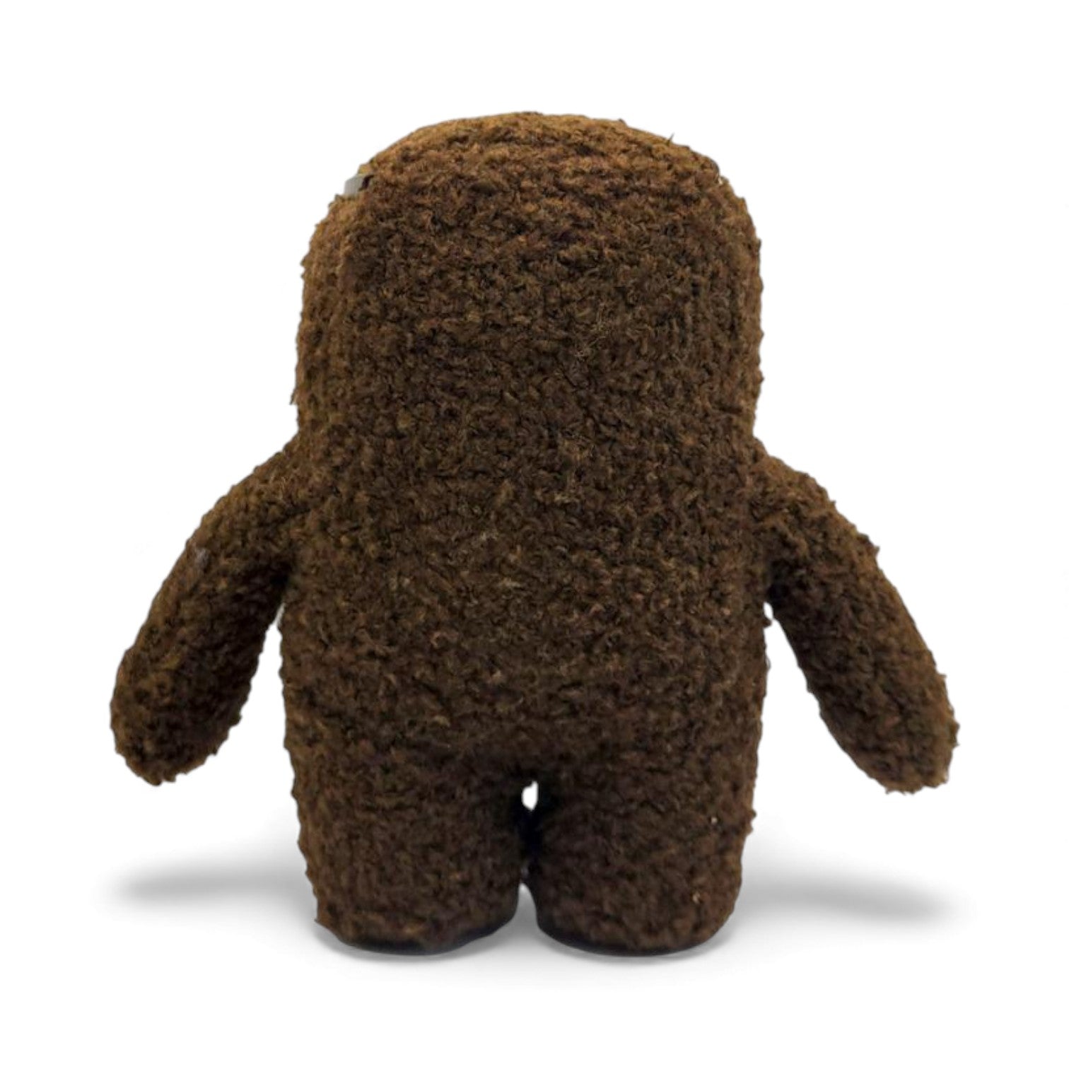 Back view of the 6.5-inch Domo plush dressed as a nerd, wearing thick black glasses with tape on the bridge and a black bow tie.