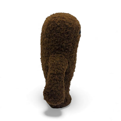 Side view of the original 6.5-inch Domo plush.