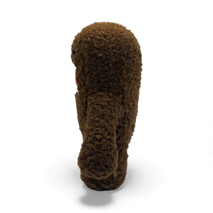 Side view of the original 6.5-inch Domo plush.