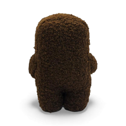 Back view of the 6.5-inch Domo plush, a brown fuzzy monster holding a small
brown pot with a yellow flower.