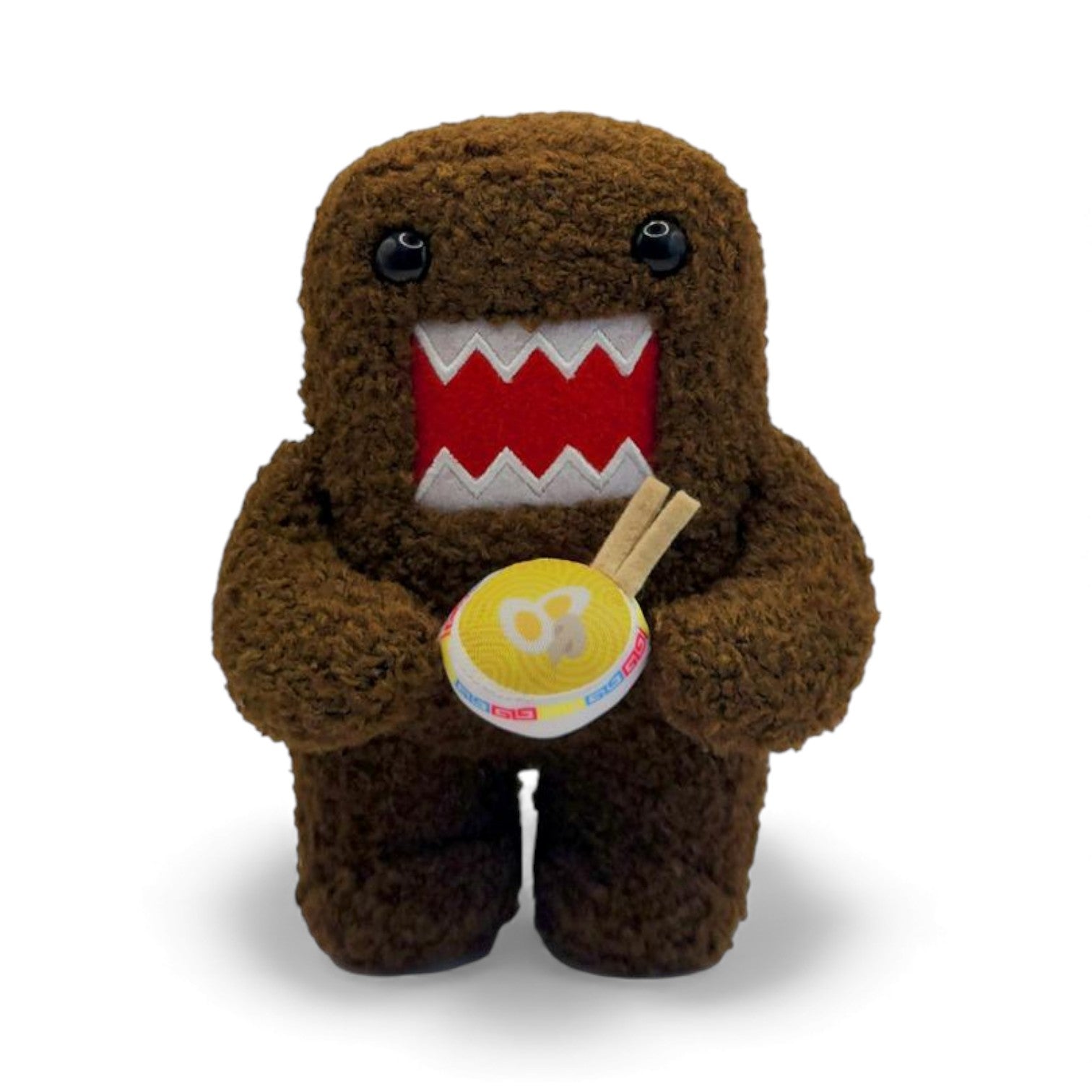 Product view of the 6.5-inch Domo plush, a brown fuzzy monster with an open mouth holding a bowl of ramen noodles with chopsticks.