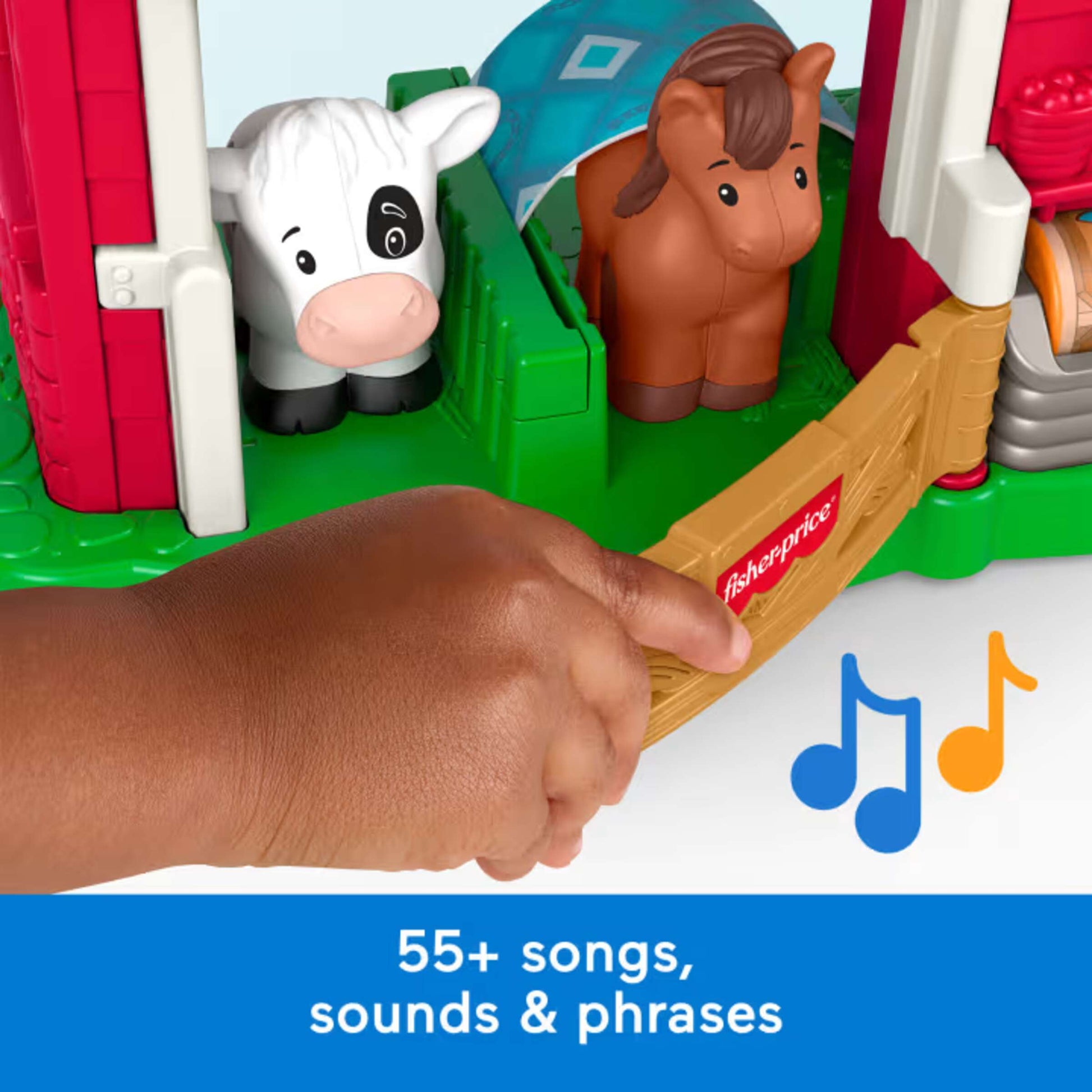 Fisher-Price Little People Caring Fun Animal Farm playset featuring a red two-story barn, a farmer figure, and animal figures.