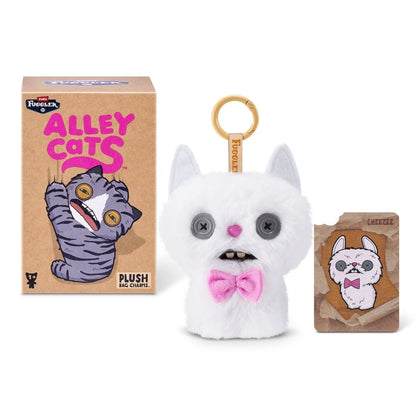 ZURU Fuggler Alley Cats blind box packaging alongside an assortment of plush bag charms featuring human-like teeth.