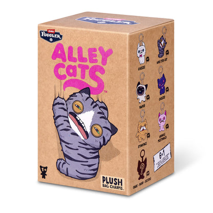 ZURU Fuggler Alley Cats blind box packaging alongside an assortment of plush bag charms featuring human-like teeth.